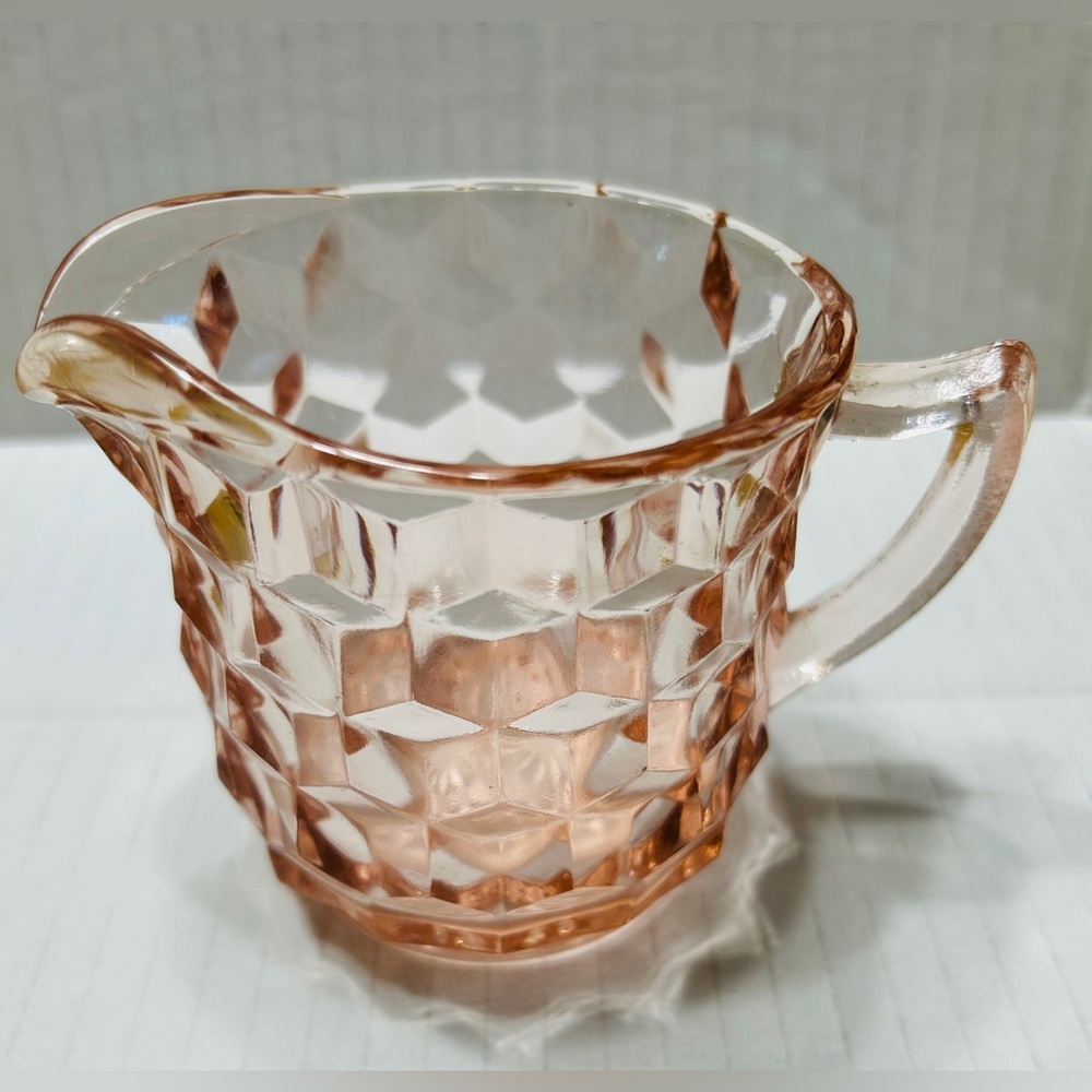 Pink creamer, cubist made by Jeanette glass 1930’s. Rare. No blemishes.